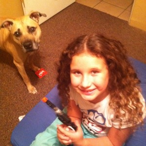 Playing Cops and Robbers with her dog